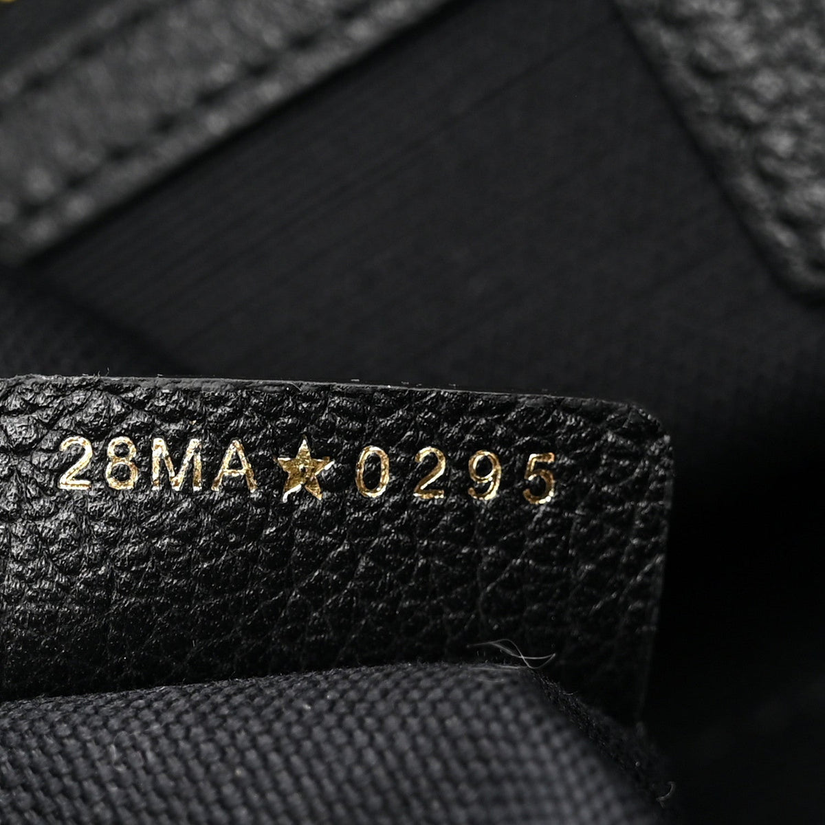 Grained Calfskin Flat Macrocannage Medium Voyage Bag Black